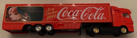 10334-1 € 5,00 coca cola vrachtwagen kerstman met fles ca 18 cm.jpeg